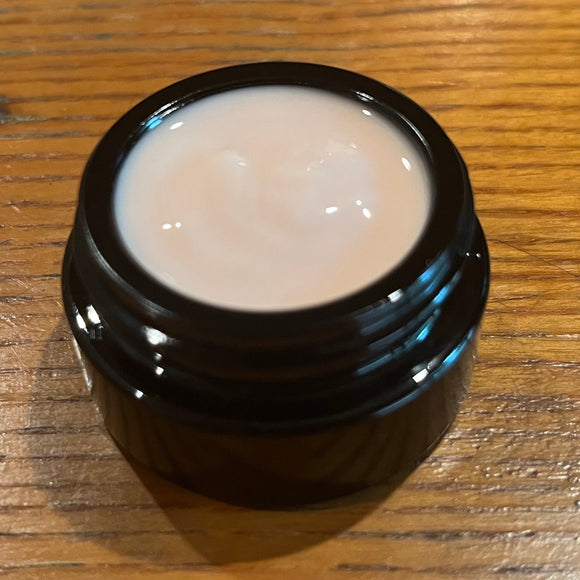 Pink Pearl Moisturizer in light filtering container 