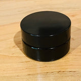 pink pearl moisturizer in ultra-violet glass